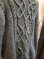 DETAIL TORSADES TRICOT SUR GILET